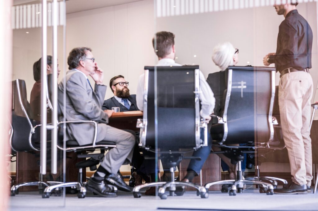 Businessman making presentation to team in board meeting